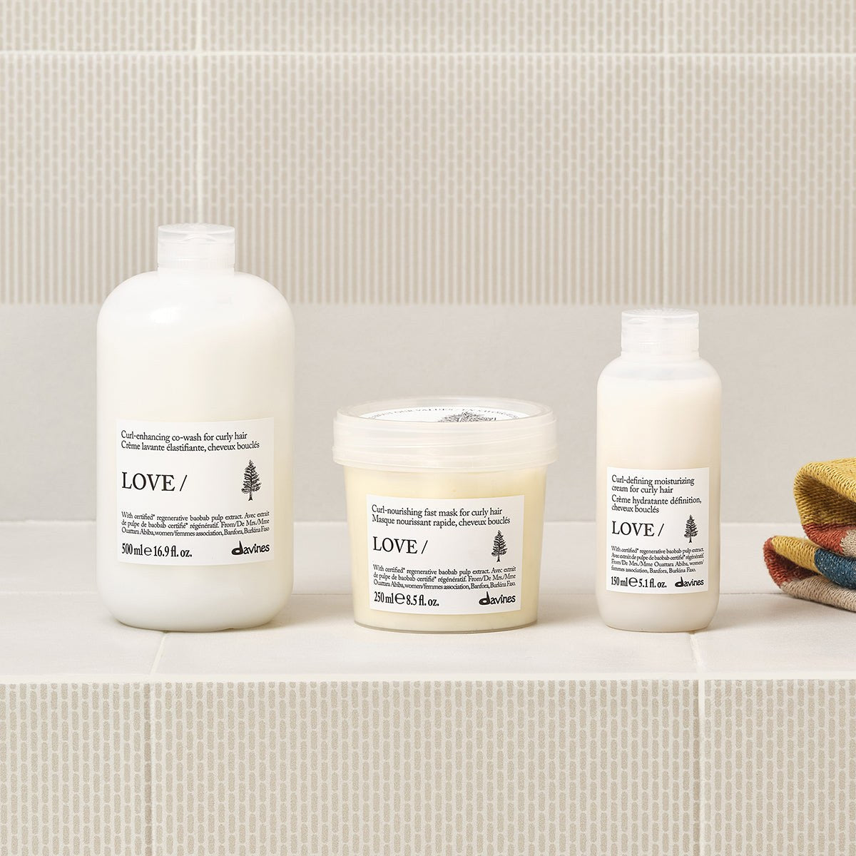 Davines LOVE Curl Hair Mask with the LOVE Curl range on a bathroom shelf